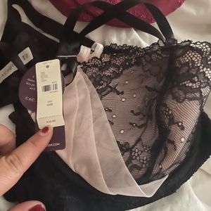 2 Bras- nwt. Size 44B. One is a burgundy color. Other is pink and black.